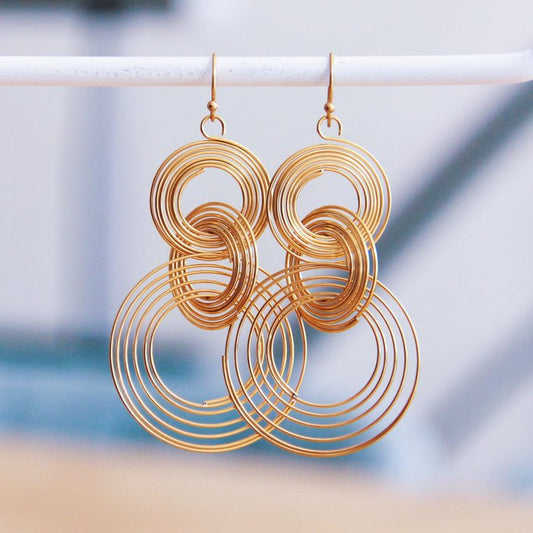 RVS statement oorbel gedraaide ringen