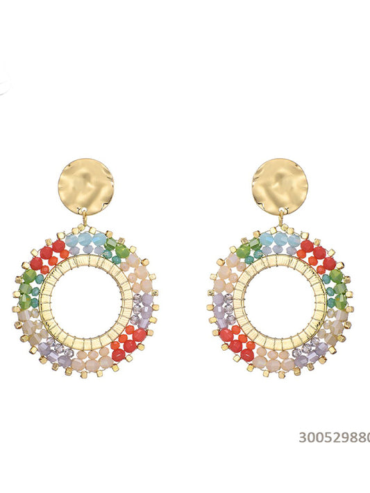 Oorbellen met gekleurde glaskralen