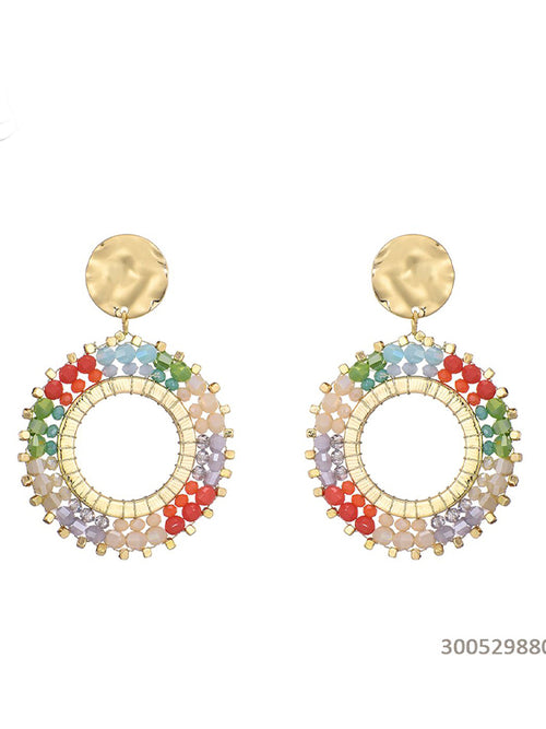 Oorbellen met gekleurde glaskralen