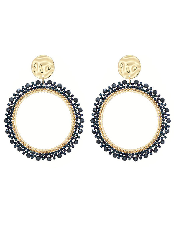 Goudkleurige oorbellen met blauwe miyuki beads